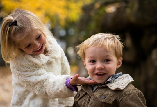 Two kids looking happy